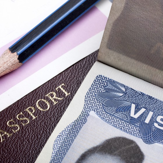 Passport and US visa background with  immigration application form.
